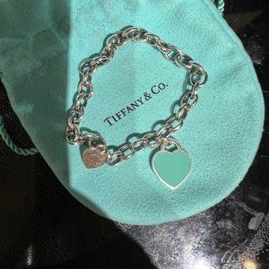 Authentic Tiffany Charm Link Bracelet (2 charms included).